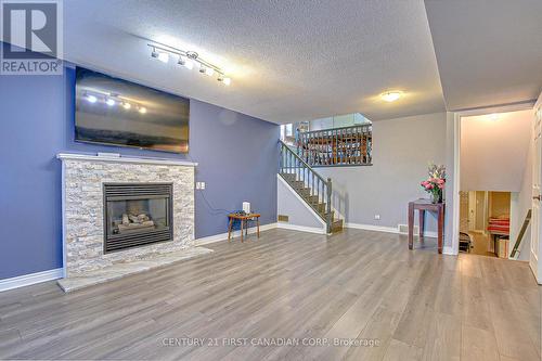 34 Kristina Crescent, London, ON - Indoor Photo Showing Living Room With Fireplace