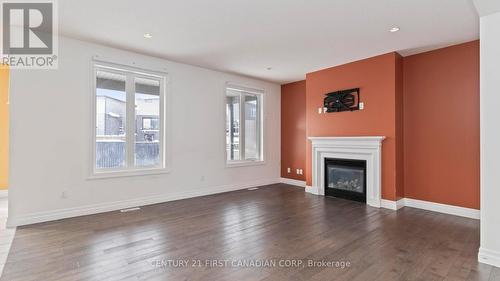 2005 Wateroak Drive, London, ON - Indoor Photo Showing Living Room With Fireplace