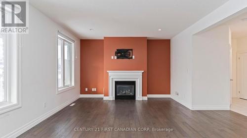 2005 Wateroak Drive, London, ON - Indoor Photo Showing Living Room With Fireplace