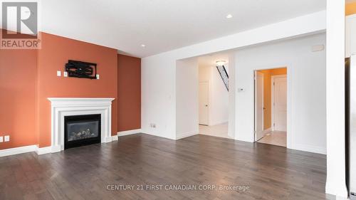 2005 Wateroak Drive, London, ON - Indoor Photo Showing Living Room With Fireplace