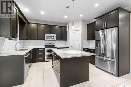 526 Baltzan Bay, Saskatoon, SK - Indoor Photo Showing Kitchen With Upgraded Kitchen