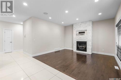 526 Baltzan Bay, Saskatoon, SK - Indoor With Fireplace