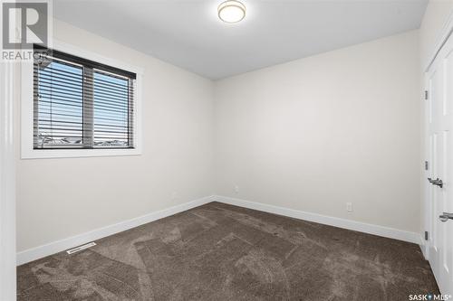 526 Baltzan Bay, Saskatoon, SK - Indoor Photo Showing Other Room