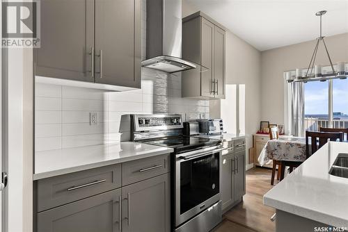 3539 Green Turtle Road, Regina, SK - Indoor Photo Showing Kitchen With Double Sink