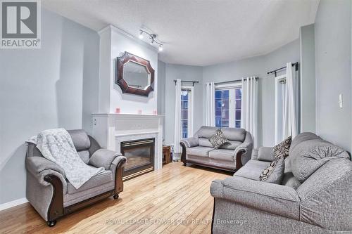 6918 Buttle Station Place, Mississauga, ON - Indoor Photo Showing Living Room With Fireplace