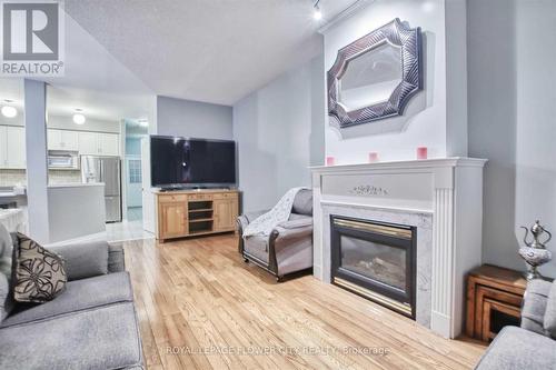 6918 Buttle Station Place, Mississauga, ON - Indoor Photo Showing Living Room With Fireplace