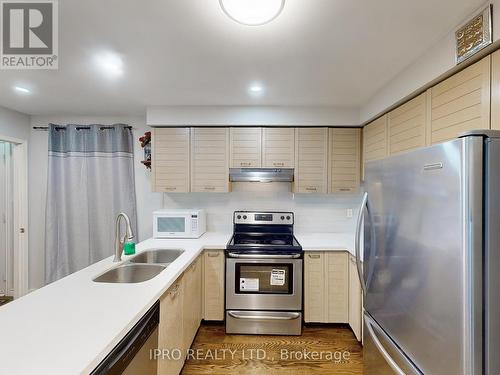 4387 Violet Road, Mississauga, ON - Indoor Photo Showing Kitchen With Double Sink