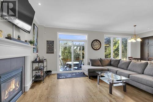 835 Woodroffe Avenue, Ottawa, ON - Indoor Photo Showing Living Room With Fireplace