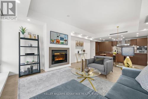 2308 - 180 University Avenue, Toronto, ON - Indoor Photo Showing Living Room With Fireplace