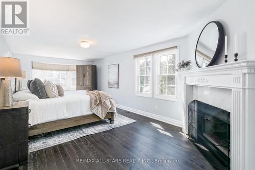 2 Harpers Croft, Markham, ON - Indoor Photo Showing Bedroom With Fireplace