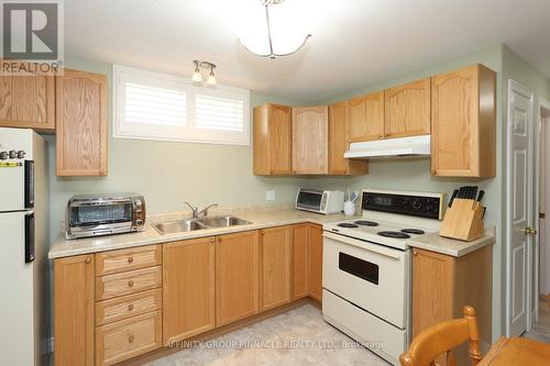 5 Susan Court, Kawartha Lakes (Lindsay), ON - Indoor Photo Showing Kitchen With Double Sink