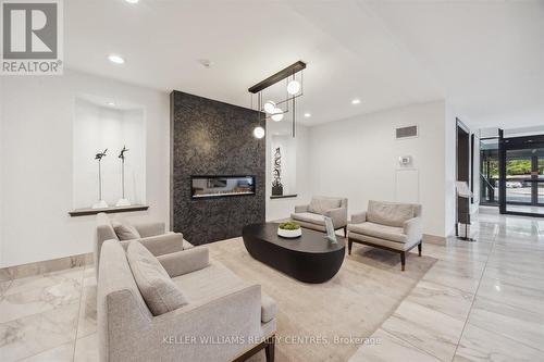 912 - 22 Clarissa Drive, Richmond Hill, ON - Indoor Photo Showing Living Room With Fireplace