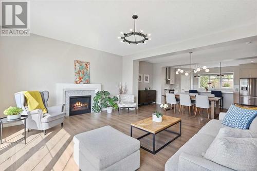 246 Sage Meadows Green Nw, Calgary, AB - Indoor Photo Showing Living Room With Fireplace