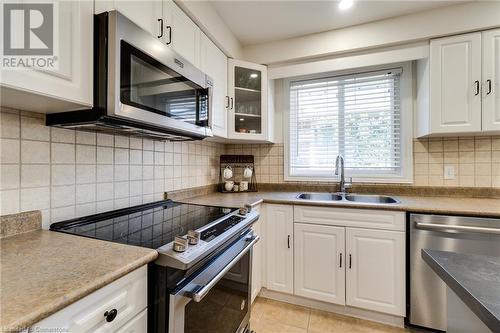 3448 Caplan Crescent, Burlington, ON - Indoor Photo Showing Kitchen With Double Sink