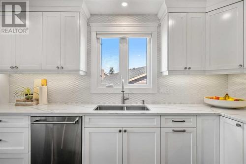 Sink with window - 432 Strathcona Mews Sw, Calgary, AB - Indoor Photo Showing Kitchen With Double Sink With Upgraded Kitchen