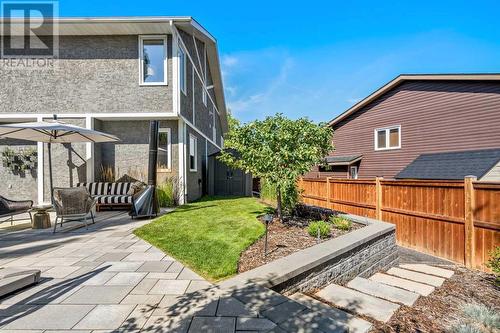 Landscaped perfectly - 432 Strathcona Mews Sw, Calgary, AB - Outdoor With Deck Patio Veranda With Exterior