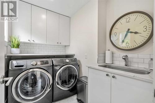 Laundry room - 432 Strathcona Mews Sw, Calgary, AB - Indoor Photo Showing Laundry Room