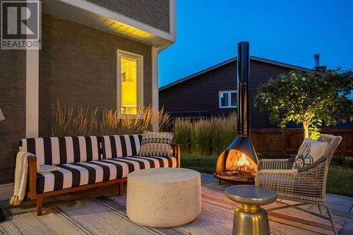 Fire pit and lounge area - 432 Strathcona Mews Sw, Calgary, AB - Outdoor With Deck Patio Veranda With Exterior