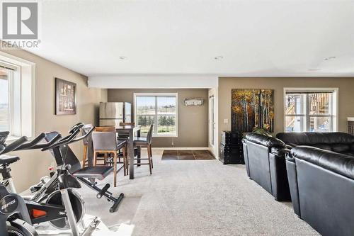 69 Evansbrooke Park Nw, Calgary, AB - Indoor Photo Showing Gym Room