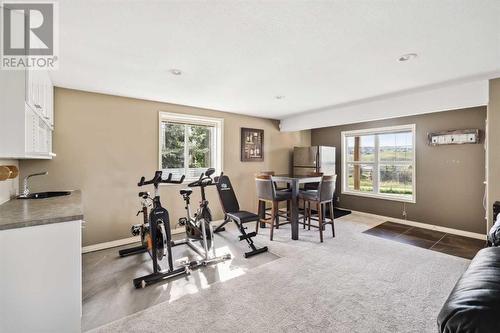 69 Evansbrooke Park Nw, Calgary, AB - Indoor Photo Showing Gym Room