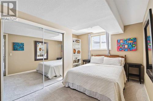 69 Evansbrooke Park Nw, Calgary, AB - Indoor Photo Showing Bedroom