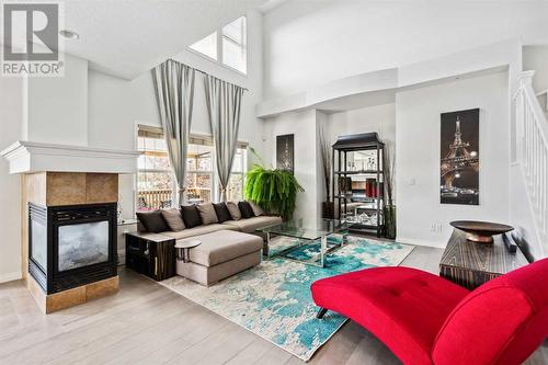 69 Evansbrooke Park Nw, Calgary, AB - Indoor Photo Showing Living Room With Fireplace