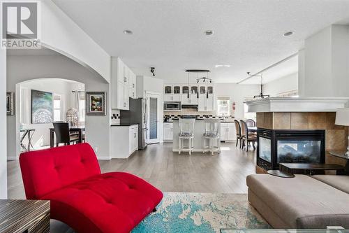 69 Evansbrooke Park Nw, Calgary, AB - Indoor Photo Showing Living Room With Fireplace