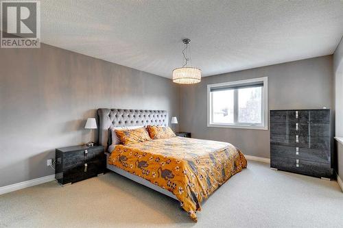 51 Evergreen Manor Sw, Calgary, AB - Indoor Photo Showing Bedroom