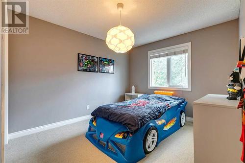 51 Evergreen Manor Sw, Calgary, AB - Indoor Photo Showing Bedroom