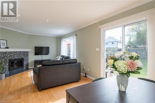 Open Concept - 635 Beaver Court, Milton, ON - Indoor Photo Showing Living Room With Fireplace