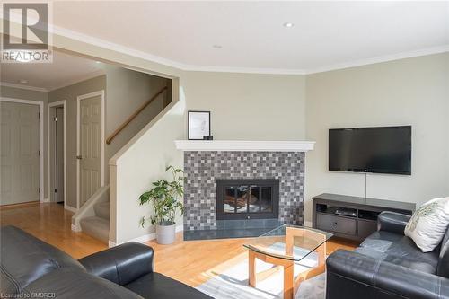 Wood Fireplace - 635 Beaver Court, Milton, ON - Indoor Photo Showing Living Room With Fireplace