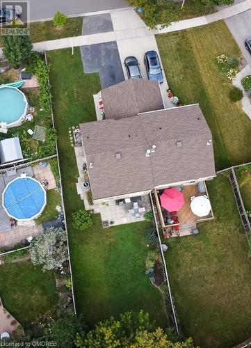 Extra Large Backyard - 635 Beaver Court, Milton, ON - Outdoor With Above Ground Pool