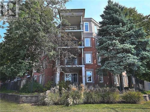 2301 Parkhaven Boulevard Unit# 204, Oakville, ON - Outdoor With Balcony