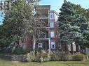 2301 Parkhaven Boulevard Unit# 204, Oakville, ON  - Outdoor With Balcony 