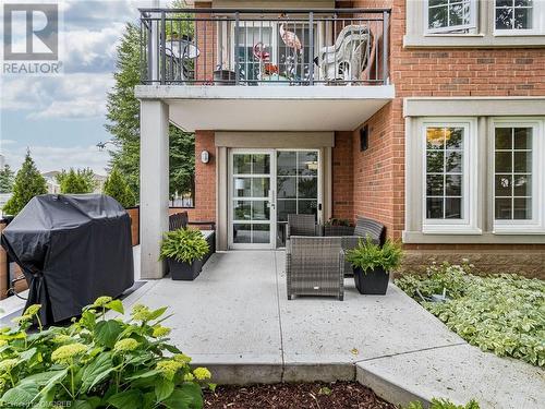 2301 Parkhaven Boulevard Unit# 204, Oakville, ON - Outdoor With Balcony