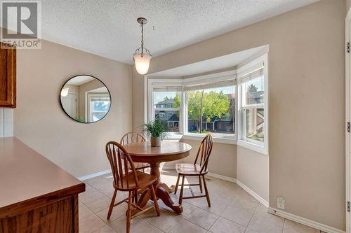 Breakfast Nook - 153 Woodglen Grove Sw, Calgary, AB - Indoor Photo Showing Dining Room