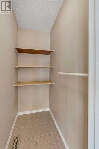 Pantry off Breakfast Nook - 153 Woodglen Grove Sw, Calgary, AB - Indoor With Storage