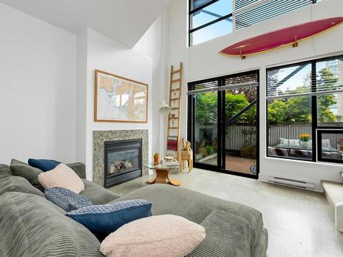 209-400 Sitkum Rd, Victoria, BC - Indoor Photo Showing Living Room With Fireplace