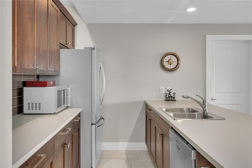 678 Peridot Court, Kelowna, BC - Indoor Photo Showing Kitchen With Double Sink