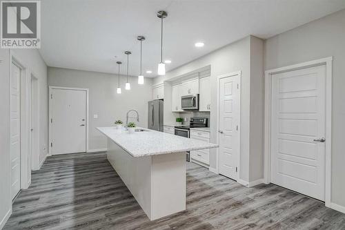 135, 20 Seton Park Se, Calgary, AB - Indoor Photo Showing Kitchen With Upgraded Kitchen