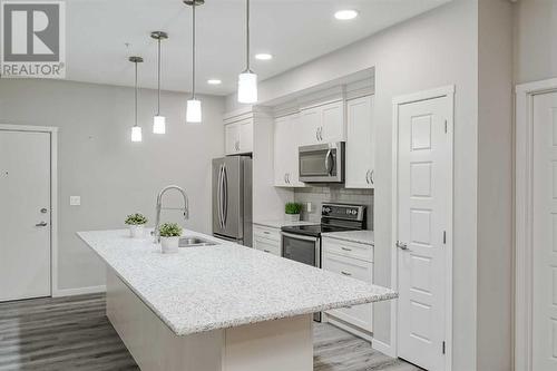 135, 20 Seton Park Se, Calgary, AB - Indoor Photo Showing Kitchen With Upgraded Kitchen