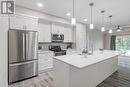 135, 20 Seton Park Se, Calgary, AB  - Indoor Photo Showing Kitchen With Upgraded Kitchen 