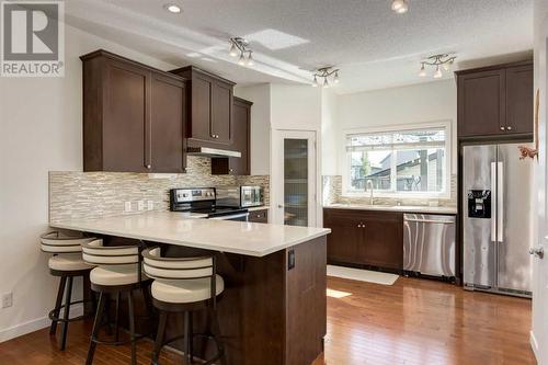 35 Nolanfield Heights Nw, Calgary, AB - Indoor Photo Showing Kitchen With Stainless Steel Kitchen With Double Sink