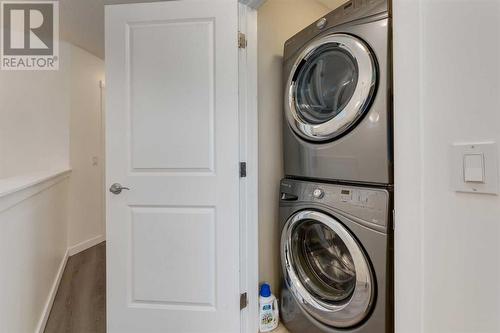 35 Nolanfield Heights Nw, Calgary, AB - Indoor Photo Showing Laundry Room