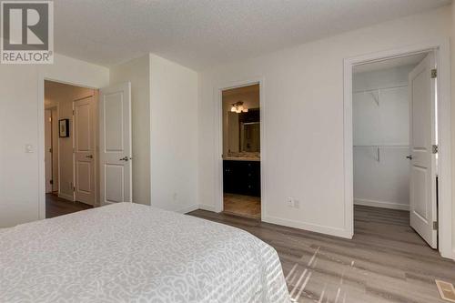 35 Nolanfield Heights Nw, Calgary, AB - Indoor Photo Showing Bedroom