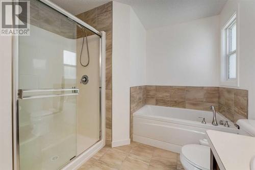 35 Nolanfield Heights Nw, Calgary, AB - Indoor Photo Showing Bathroom