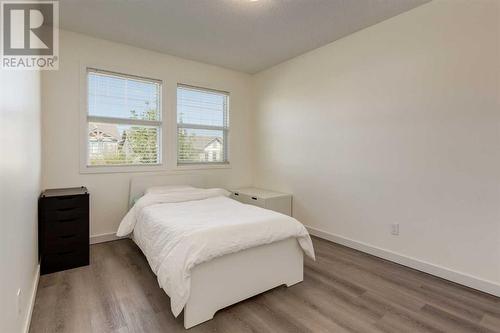 35 Nolanfield Heights Nw, Calgary, AB - Indoor Photo Showing Bedroom