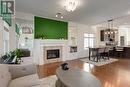 35 Nolanfield Heights Nw, Calgary, AB  - Indoor Photo Showing Living Room With Fireplace 