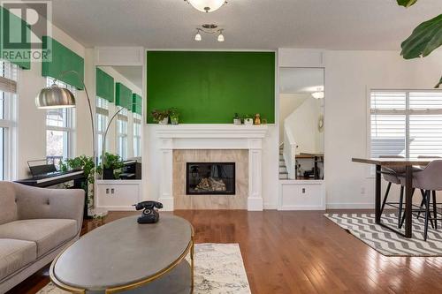 35 Nolanfield Heights Nw, Calgary, AB - Indoor Photo Showing Living Room With Fireplace