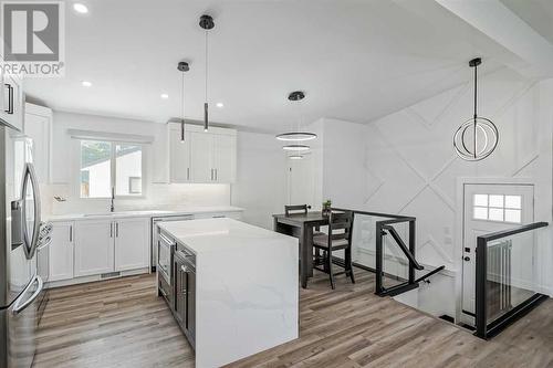 1315 105 Avenue Sw, Calgary, AB - Indoor Photo Showing Kitchen With Upgraded Kitchen